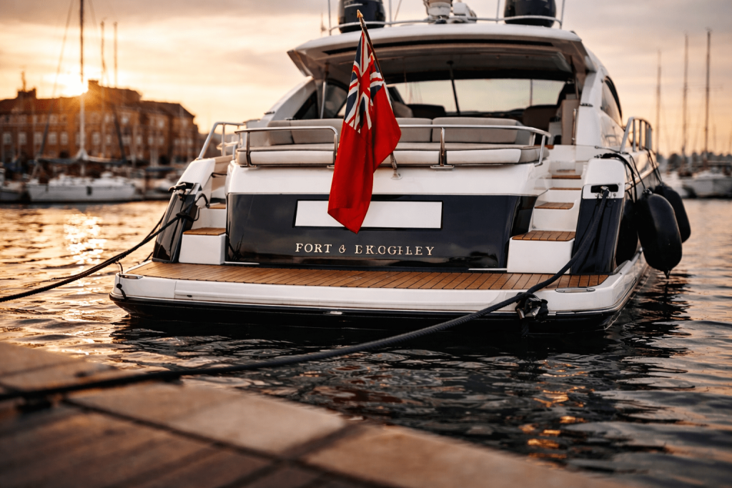 Luxury yacht registered under UK Part 1 in marina setting